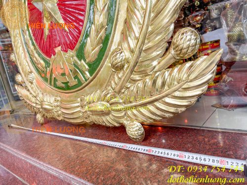 Huy hiệu công an bằng đồng gò tay