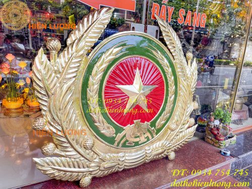 Logo huy hiệu công an bằng đồng gò tay