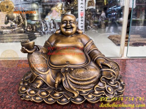 Tượng Di Lặc Ngồi Cầm Thỏi Vàng Bằng Đồng Hun