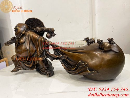 Tượng Di Lặc Kéo Bao Tài Lộc Bằng Đồng Dài 42cm