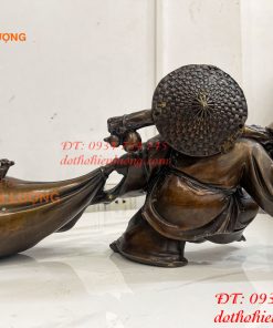 Tượng Di Lặc Kéo Bao Tài Lộc Bằng Đồng Dài 42cm