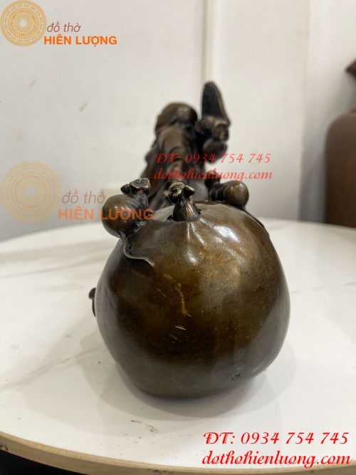 Tượng Di Lặc Kéo Bao Tài Lộc Bằng Đồng Dài 42cm