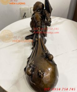 Tượng Di Lặc Kéo Bao Tài Lộc Bằng Đồng Dài 42cm