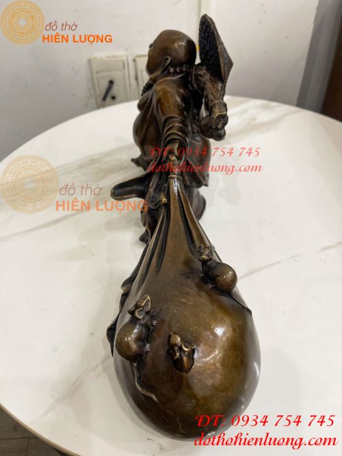 Tượng Di Lặc Kéo Bao Tài Lộc Bằng Đồng Dài 42cm