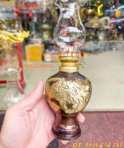 Đèn dầu bằng đồng thổi từ vỏ cát tút chạm rồng phượng
