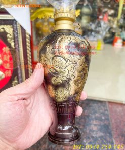 Đèn dầu bằng đồng thổi từ vỏ cát tút chạm rồng phượng