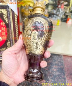 Đèn dầu bằng đồng thổi từ vỏ cát tút chạm rồng phượng