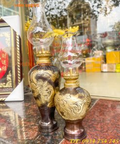 Đèn dầu bằng đồng thổi từ vỏ cát tút chạm rồng phượng