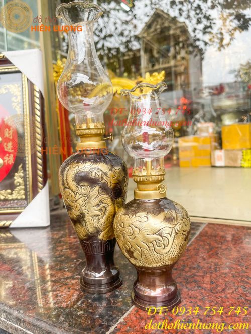 Đèn dầu bằng đồng thổi từ vỏ cát tút chạm rồng phượng