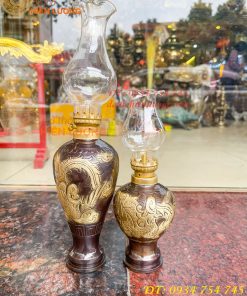 Đèn dầu bằng đồng thổi từ vỏ cát tút chạm rồng phượng