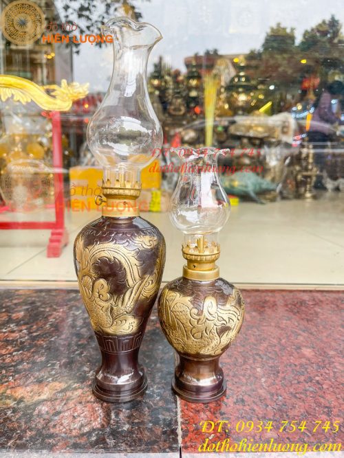 Đèn dầu bằng đồng thổi từ vỏ cát tút chạm rồng phượng