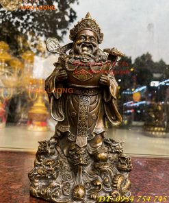 Tượng ông thần tiền đứng cửu long bằng đồng hun cao 30cm