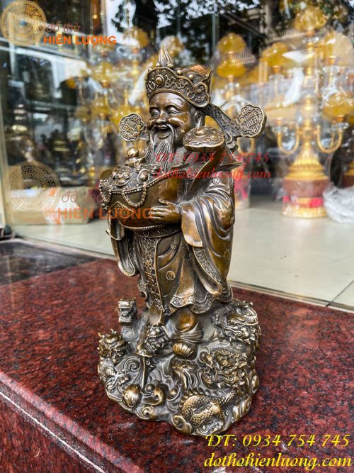 Tượng ông thần tiền đứng cửu long bằng đồng hun cao 30cm