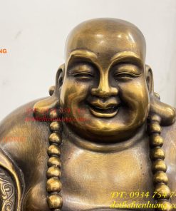 Tượng Di Lặc Dựa Bị Cầm Thỏi Vàng Bằng Đồng