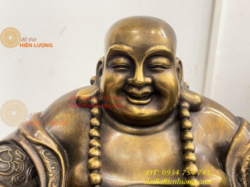 Tượng Di Lặc Dựa Bị Cầm Thỏi Vàng Bằng Đồng