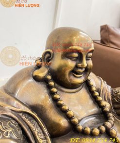 Tượng Di Lặc Dựa Bị Cầm Thỏi Vàng Bằng Đồng