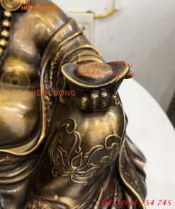 Tượng Di Lặc Dựa Bị Cầm Thỏi Vàng Bằng Đồng